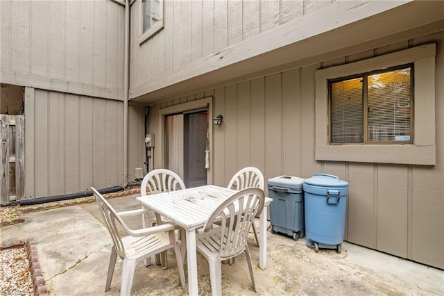 view of patio / terrace featuring fence and outdoor dining space