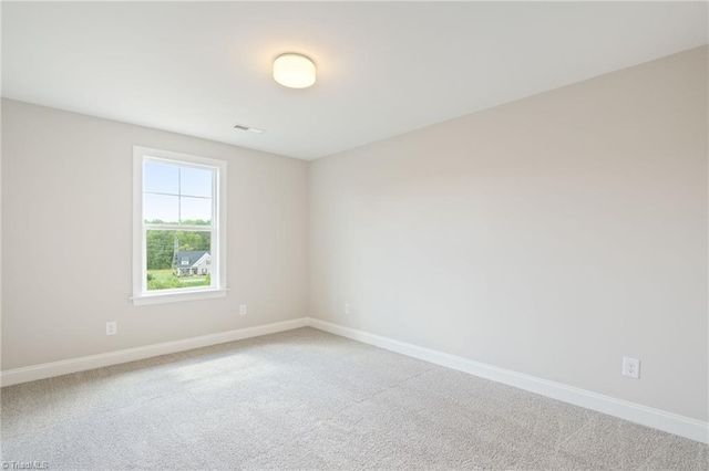 empty room with carpet flooring