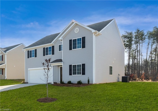 view of front of home featuring a garage, central AC unit, and a front yard