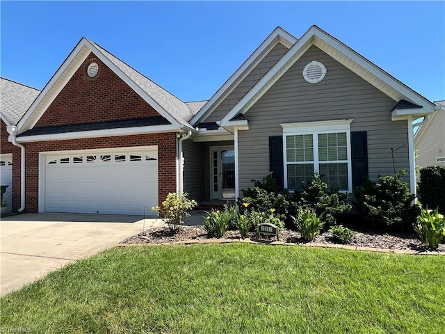 111 Braewyck Ln, King, NC 27021 - view of front of house with an attached garage, concrete driveway, a front lawn, and brick siding