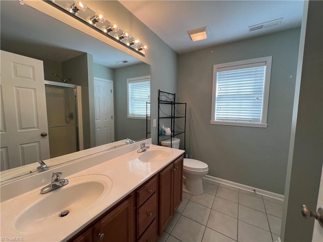 111 Braewyck Ln, King, NC 27021 - bathroom featuring a shower stall, double vanity, and tile patterned floors