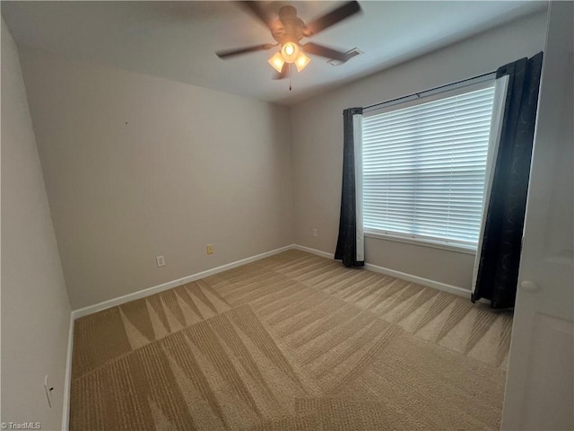111 Braewyck Ln, King, NC 27021 - spare room with light colored carpet and a ceiling fan