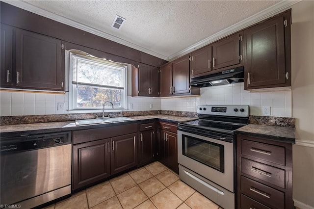 kitchen featuring backsplash, crown molding, sink, light tile patterned floors, and stainless steel appliances