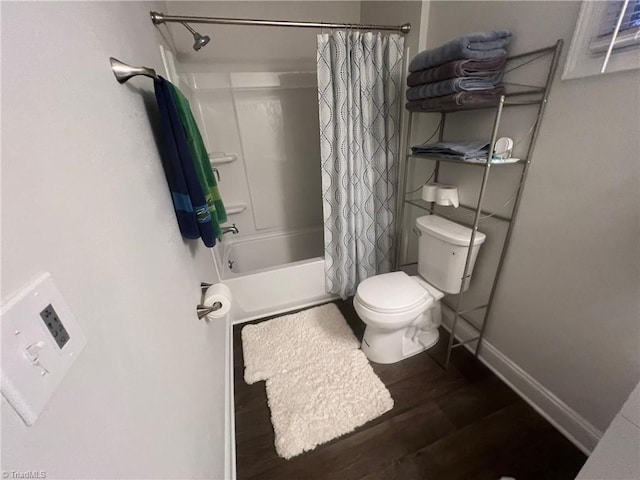 bathroom featuring shower / bath combination with curtain, toilet, and wood-type flooring