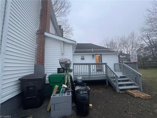 rear view of house with a deck