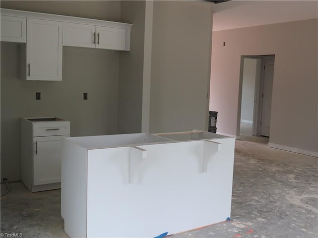 kitchen featuring white cabinets and a kitchen island