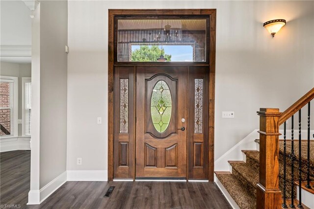 entrance foyer featuring dark hardwood / wood-style floors