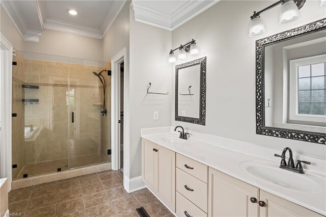 bathroom featuring vanity, crown molding, an enclosed shower, and tile patterned floors