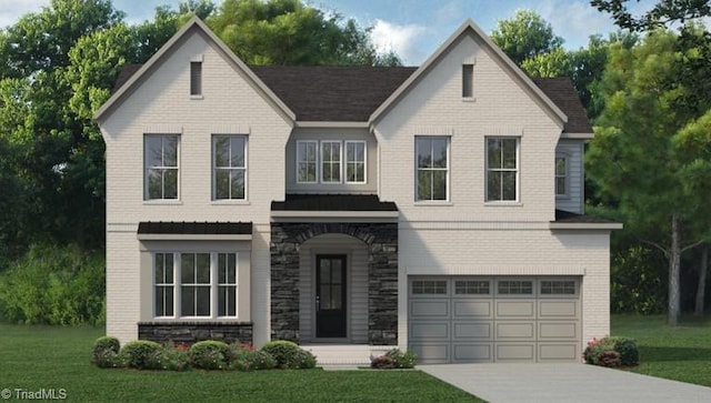 view of front facade with a garage and a front yard