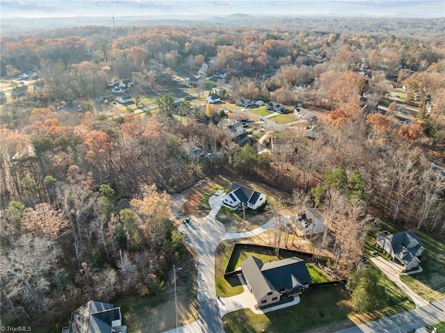 drone / aerial view with a view of trees