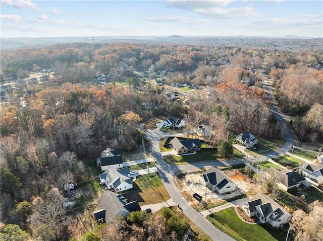 bird's eye view with a forest view