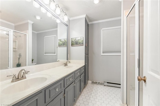 full bath with baseboard heating, crown molding, a shower stall, double vanity, and tile patterned floors