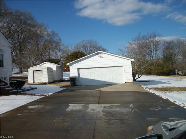 view of snow covered garage