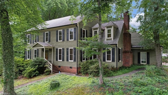 6400 Muirfield Dr, Greensboro, NC 27410 - colonial home featuring a chimney, crawl space, and roof with shingles