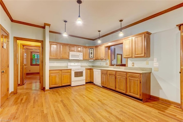 6400 Muirfield Dr, Greensboro, NC 27410 - kitchen featuring white appliances, light countertops, ornamental molding, light wood-type flooring, and decorative light fixtures