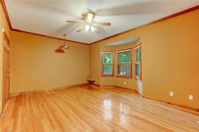6400 Muirfield Dr, Greensboro, NC 27410 - unfurnished room with ceiling fan, light wood-type flooring, and ornamental molding