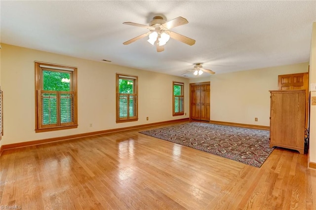 6400 Muirfield Dr, Greensboro, NC 27410 - spare room featuring light wood finished floors and ceiling fan