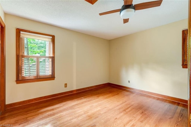 6400 Muirfield Dr, Greensboro, NC 27410 - unfurnished room featuring light wood finished floors and a ceiling fan