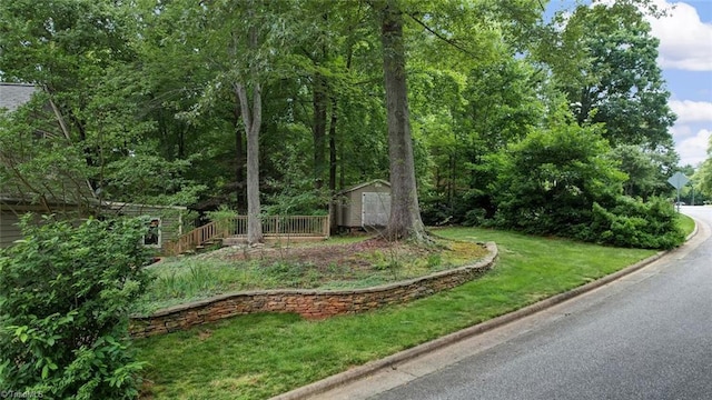 6400 Muirfield Dr, Greensboro, NC 27410 - view of yard with a storage unit