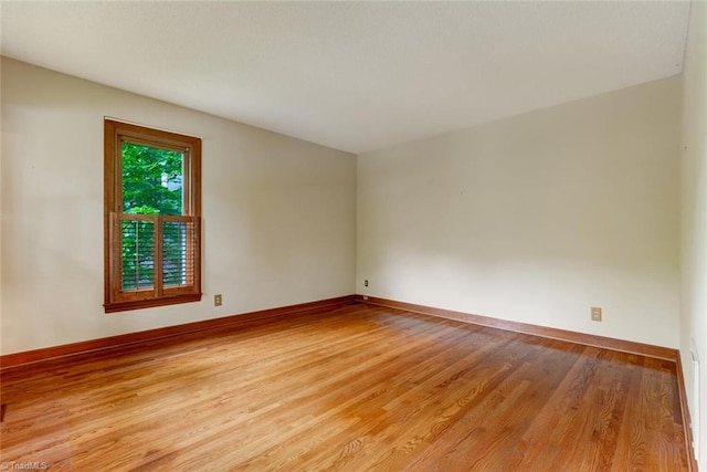 6400 Muirfield Dr, Greensboro, NC 27410 - spare room with light wood-style floors and baseboards