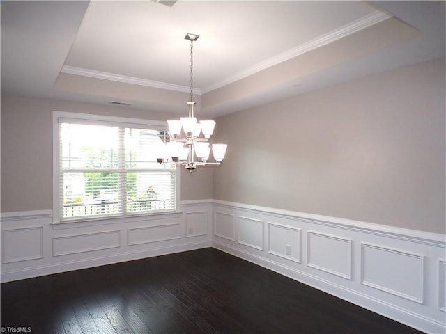 8003 Helison Ct, Stokesdale, NC 27357 - unfurnished room with a tray ceiling, crown molding, dark wood-type flooring, a chandelier, and wainscoting
