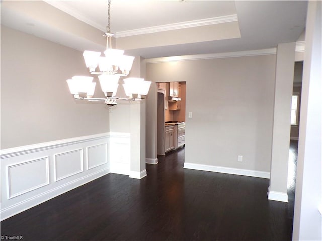 8003 Helison Ct, Stokesdale, NC 27357 - unfurnished dining area with an inviting chandelier, ornamental molding, baseboards, and dark wood finished floors