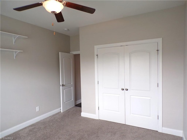 8003 Helison Ct, Stokesdale, NC 27357 - unfurnished bedroom featuring carpet, a closet, baseboards, and ceiling fan