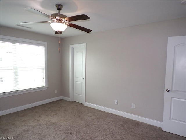 8003 Helison Ct, Stokesdale, NC 27357 - unfurnished room with ceiling fan, light carpet, and baseboards
