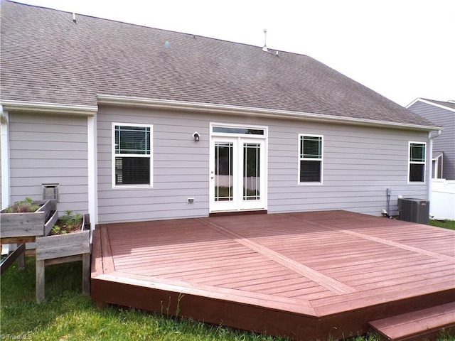 8003 Helison Ct, Stokesdale, NC 27357 - back of property featuring a wooden deck, cooling unit, and roof with shingles