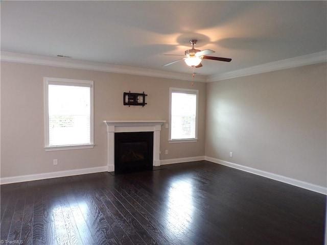8003 Helison Ct, Stokesdale, NC 27357 - unfurnished living room featuring a ceiling fan, dark wood-style floors, a fireplace with flush hearth, crown molding, and baseboards