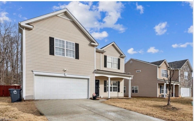 front of property featuring a porch, a garage, and a front lawn