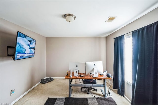 home office with light colored carpet