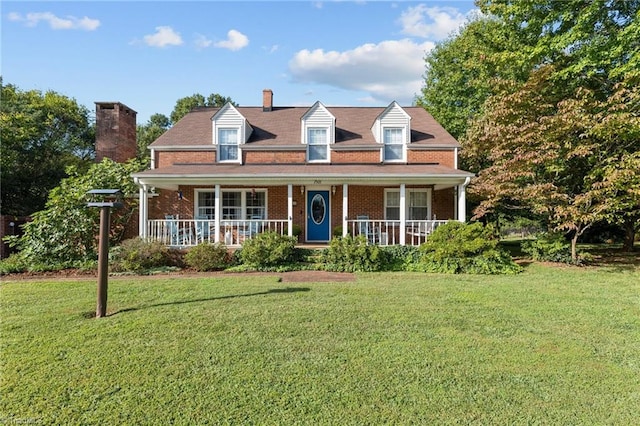 cape cod house with a front lawn and a porch