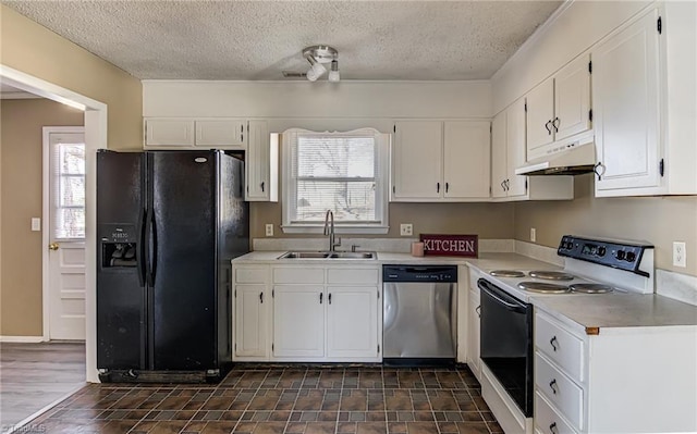 kitchen featuring black fridge, white electric range, sink, stainless steel dishwasher, and white cabinetry