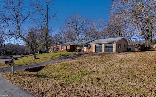 ranch-style home with a front yard