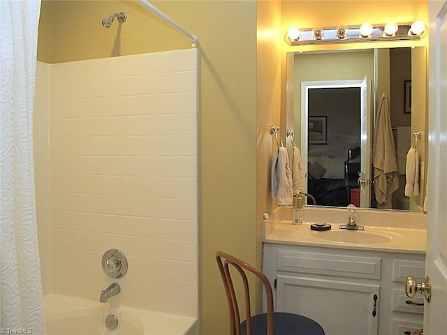 bathroom featuring shower / bath combination with curtain and vanity