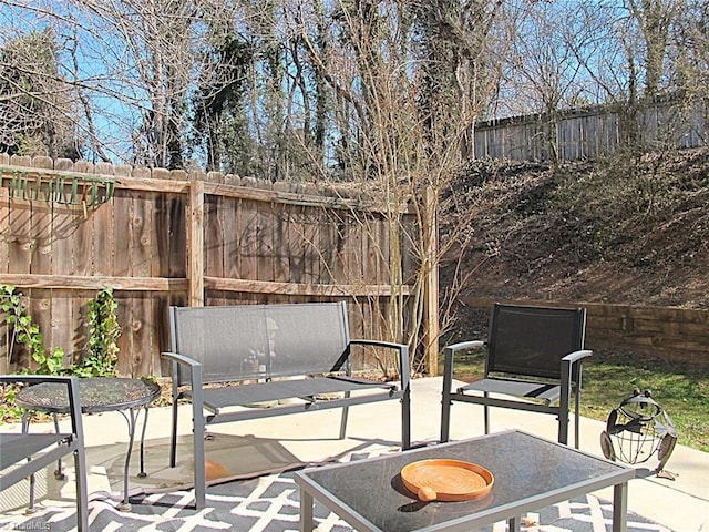 view of patio with fence