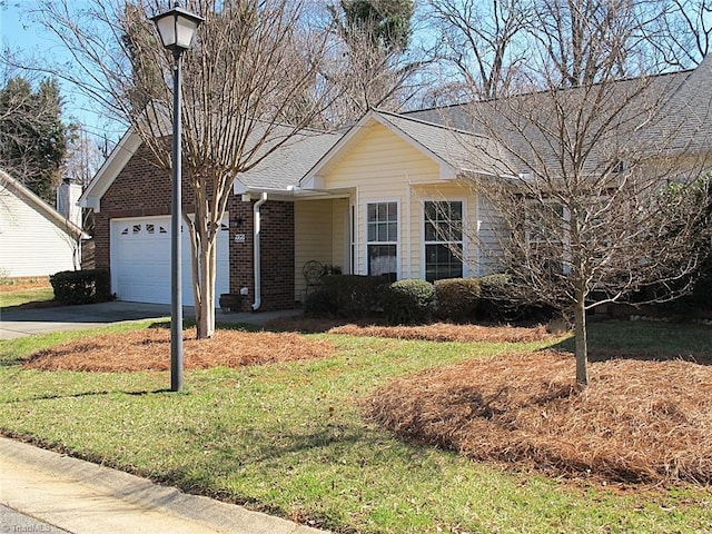 single story home featuring driveway, a shingled roof, a front lawn, a garage, and brick siding