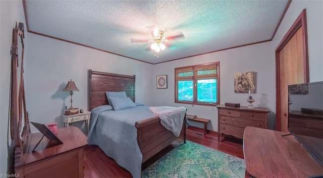 235 Hogan Bowers Rd, Thomasville, NC 27360 - bedroom with wood finished floors, a textured ceiling, ornamental molding, and a ceiling fan