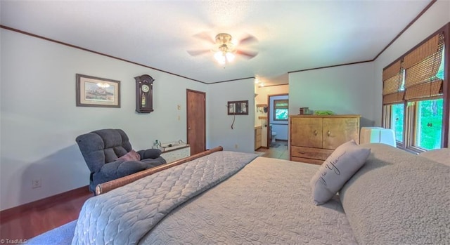 235 Hogan Bowers Rd, Thomasville, NC 27360 - bedroom featuring crown molding, baseboards, and ceiling fan