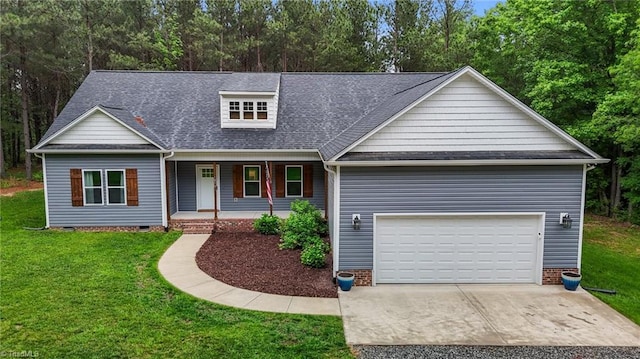 view of front of house featuring covered porch, a front lawn, driveway, roof with shingles, and an attached garage