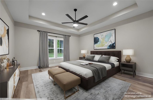 bedroom with a raised ceiling, light wood-style flooring, baseboards, recessed lighting, and ceiling fan