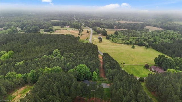 aerial overview of property's location featuring a forest