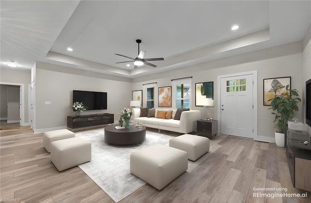 living area featuring a tray ceiling, ceiling fan, light wood-style floors, baseboards, and recessed lighting