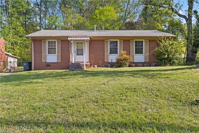 ranch-style house with brick siding, crawl space, and a front yard