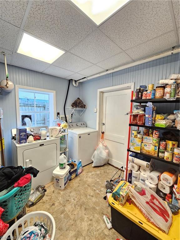 laundry area featuring washer and clothes dryer and laundry area