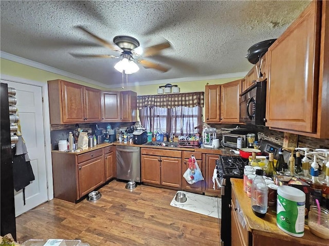 kitchen featuring brown cabinets, ornamental molding, wood finished floors, appliances with stainless steel finishes, and decorative backsplash