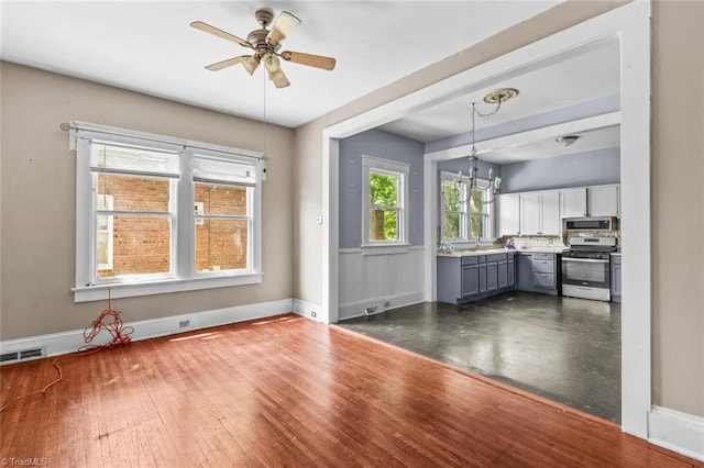 524 Horah St, Salisbury, NC 28144 - unfurnished dining area with a ceiling fan and a chandelier