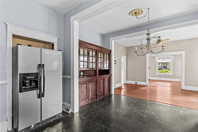 524 Horah St, Salisbury, NC 28144 - unfurnished dining area featuring a chandelier and tile patterned floors
