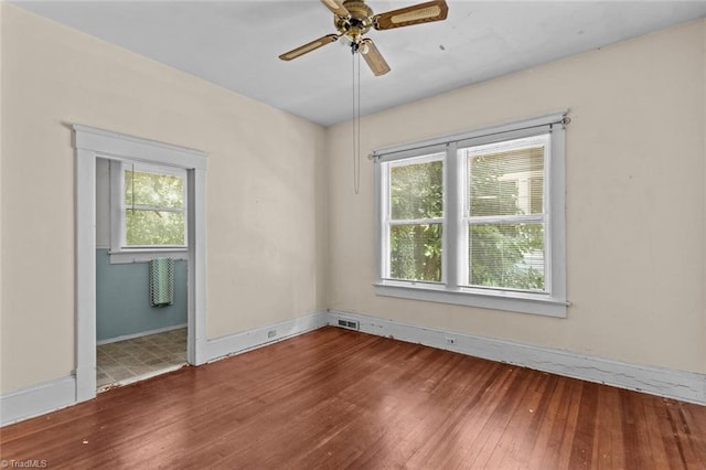 524 Horah St, Salisbury, NC 28144 - empty room featuring plenty of natural light, hardwood / wood-style floors, and ceiling fan